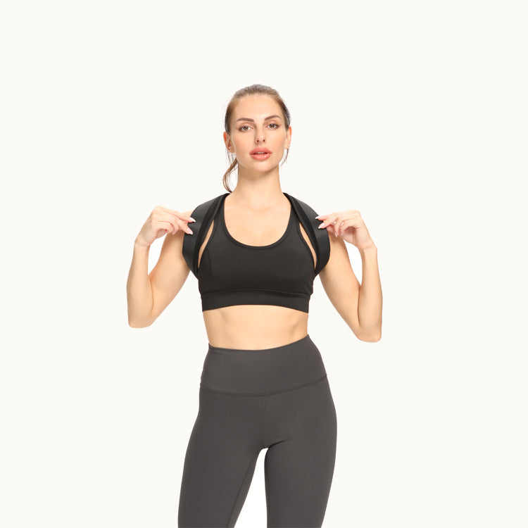 Woman wearing the PosturePro back posture corrector over a sports top, front view