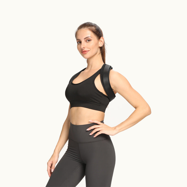 Woman wearing the black posture corrector belt, three-quarter view