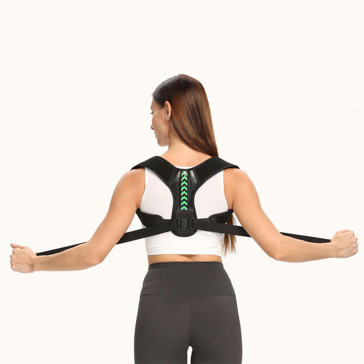 Back view of a woman wearing the posture corrector belt with green back panel