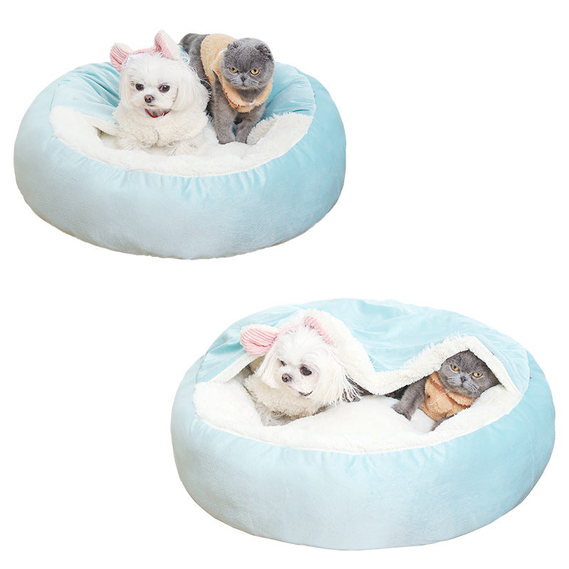 Light blue round hooded pet bed with a small dog and a gray cat inside